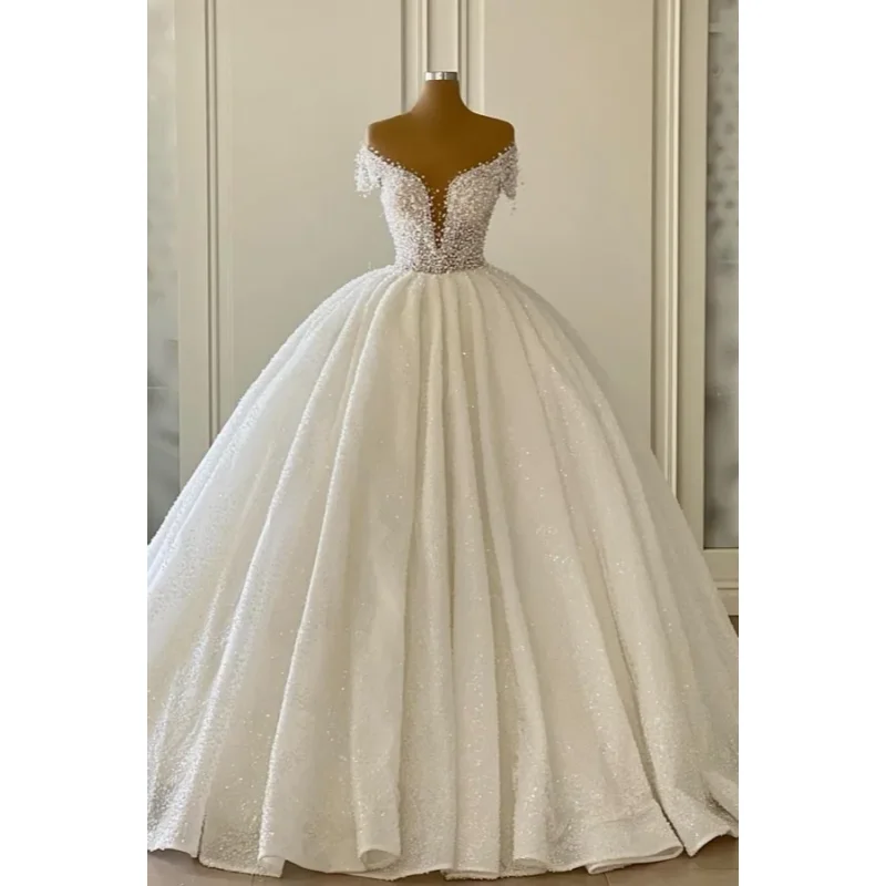 Custom 2026 New Luxurious And Sexy Wedding Dress With Deep V-Neck Short Sleeved Pearl Decoration Large Skirt Vestido De Novia
Custom 2026 New Luxurious And Sexy Wedding Dress With Deep V-Neck Short Sleeved Pearl Decoration Large Skirt Vestido De Novia