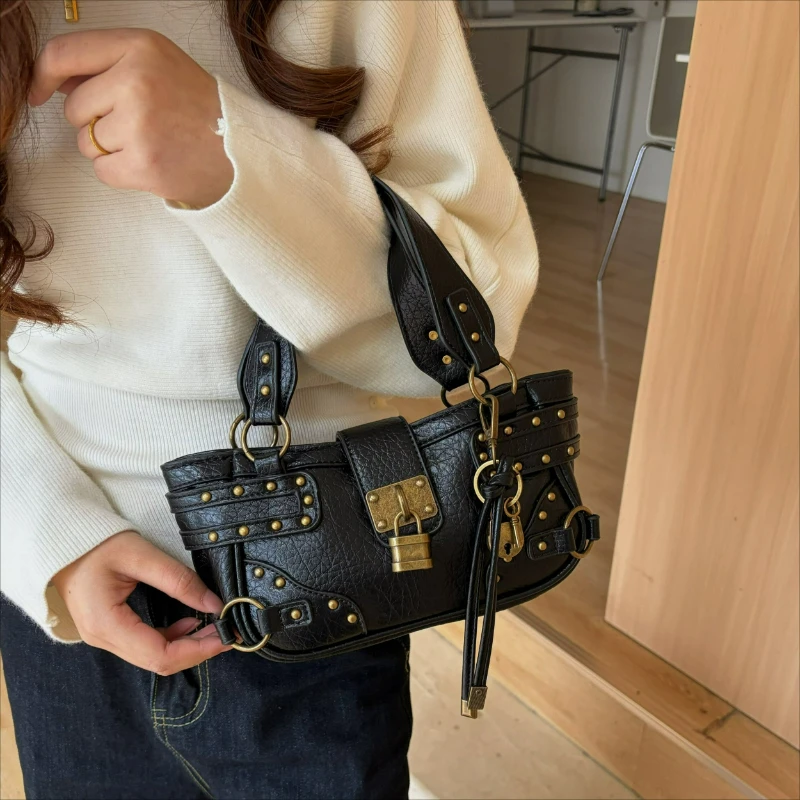New Trendy and Cool Buckle Motorcycle Crossbody Bag, with A Lock Design. Small-sized Handbag. High-quality Bag for Ladies.
New Trendy and Cool Buckle Motorcycle Crossbody Bag, with A Lock Design. Small-sized Handbag. High-quality Bag for Ladies.