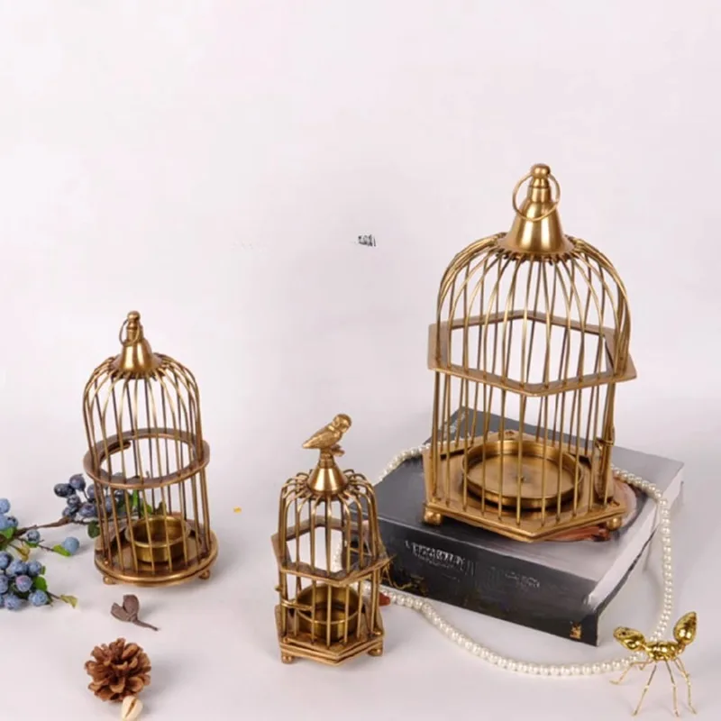 Европейский латунный домашний орнамент в стиле ретро и старый подсвечник в виде птичьей клетки для привлечения богатства
Европейский латунный домашний орнамент в стиле ретро и старый подсвечник в виде птичьей клетки для привлечения богатства
