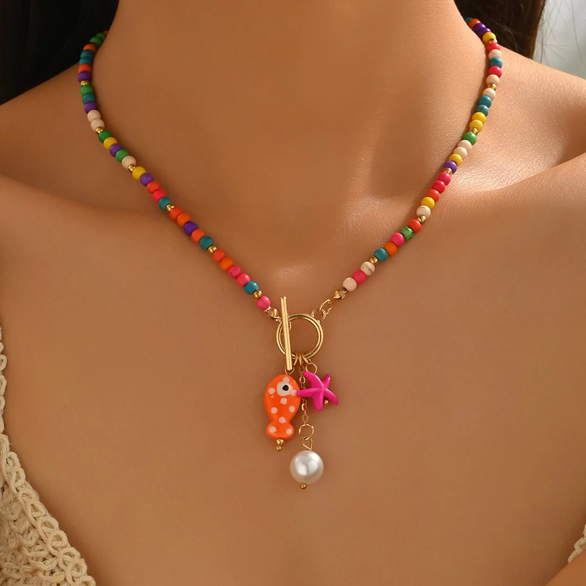 Bohemian Unique Fun Sea-Inspired Ceramic Fish & Starfish Pendant Necklace Dopamine Rainbow Color Beads Necklaces Beach Jewelry
Bohemian Unique Fun Sea-Inspired Ceramic Fish & Starfish Pendant Necklace Dopamine Rainbow Color Beads Necklaces Beach Jewelry