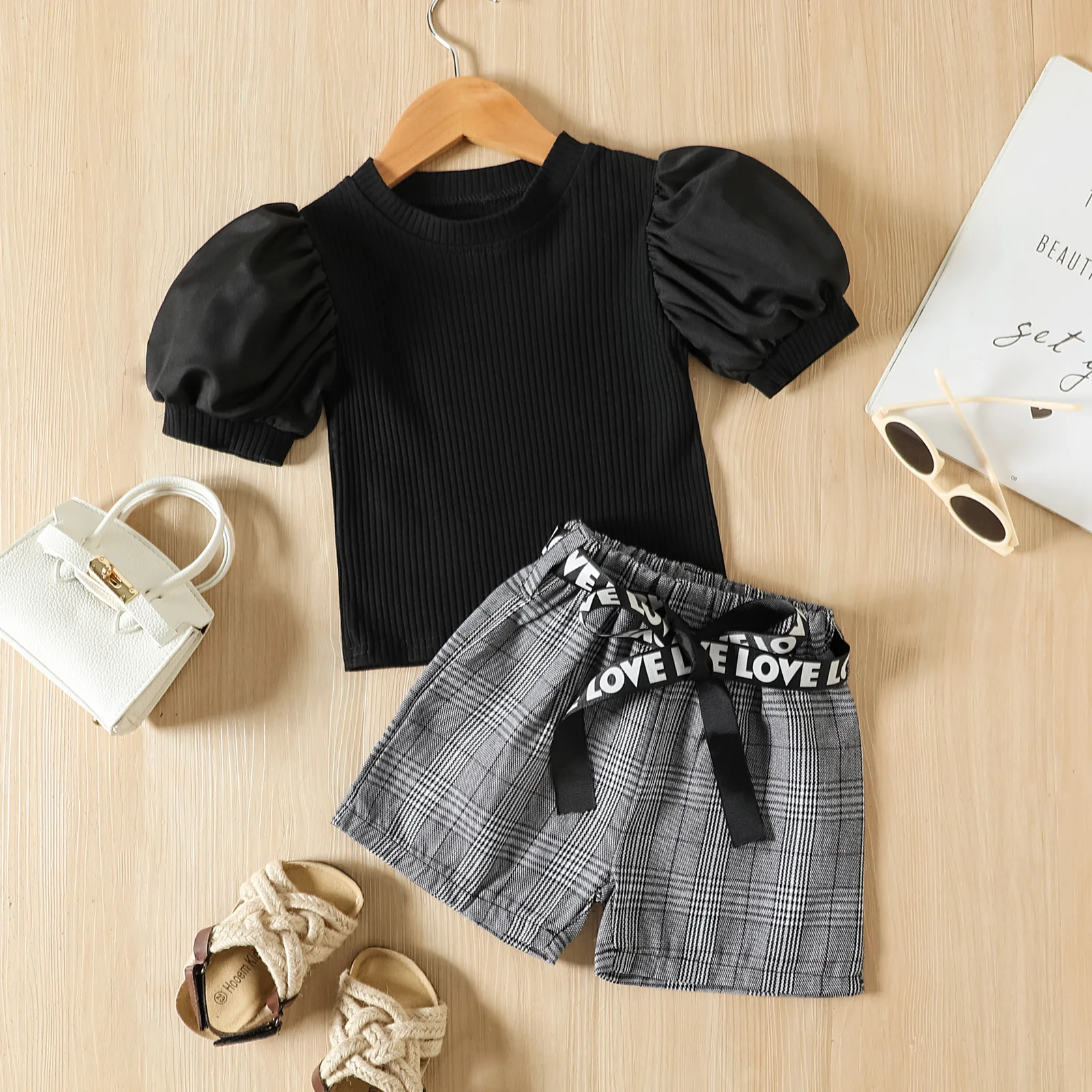 Summer Baby Girls Knitted Pit Stripes Puff Sleeve T Shirts + Plaid Shorts with Letters Belt 2 Pcs Sets Kids Clothes Girls Suits
Summer Baby Girls Knitted Pit Stripes Puff Sleeve T Shirts + Plaid Shorts with Letters Belt 2 Pcs Sets Kids Clothes Girls Suits
