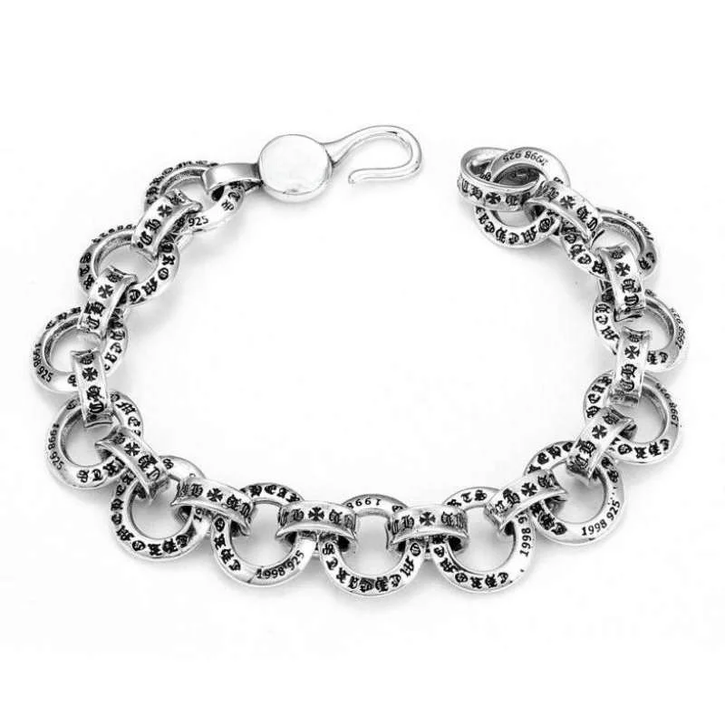 Silver Vintage Printed Link Bracelet: Gothic Ornate Statement Jewelry
Silver Vintage Printed Link Bracelet: Gothic Ornate Statement Jewelry