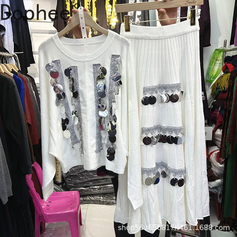 Модный женский вязаный комплект из двух предметов с блестящими пайетками, вязаный пуловер с круглым вырезом и длинными рукавами + длинные юбки трапециевидной формы с эластичной резинкой на талии
Модный женский вязаный комплект из двух предметов с блестящими пайетками, вязаный пуловер с круглым вырезом и длинными рукавами + длинные юбки трапециевидной формы с эластичной резинкой на талии