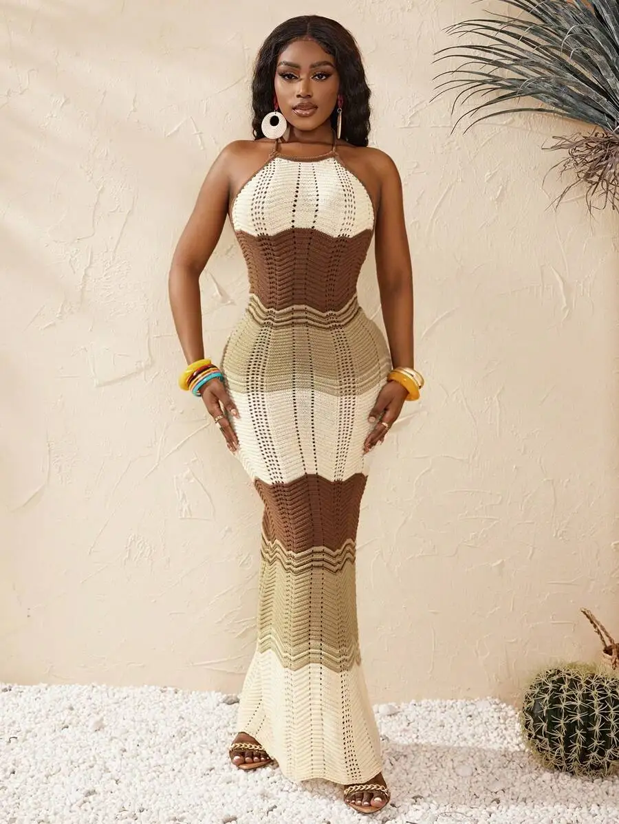 Women’s Halter Neck Crochet Maxi Dress In Beige And Brown Block Patterns With Hollow-Out Knit And Flared Hem
Women’s Halter Neck Crochet Maxi Dress In Beige And Brown Block Patterns With Hollow-Out Knit And Flared Hem