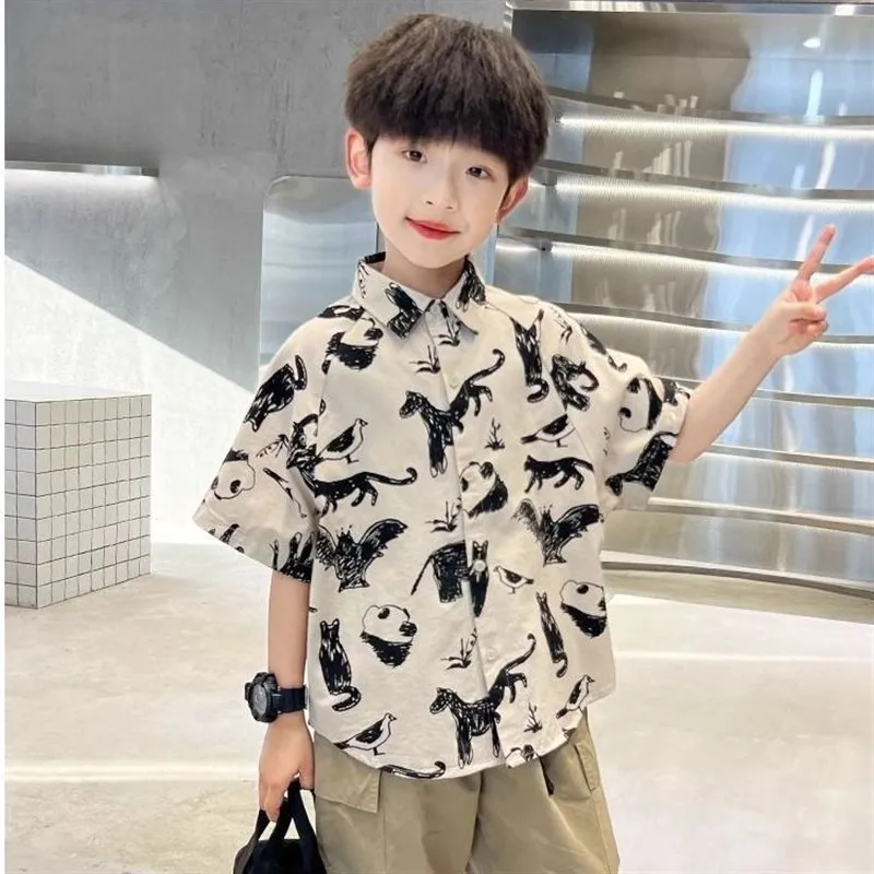 Stylish Short Sleeve Printed Shirt for Boys Thin Fashionable Korean Version Collar Open Cardigan Summer Wear for Kids
Stylish Short Sleeve Printed Shirt for Boys Thin Fashionable Korean Version Collar Open Cardigan Summer Wear for Kids