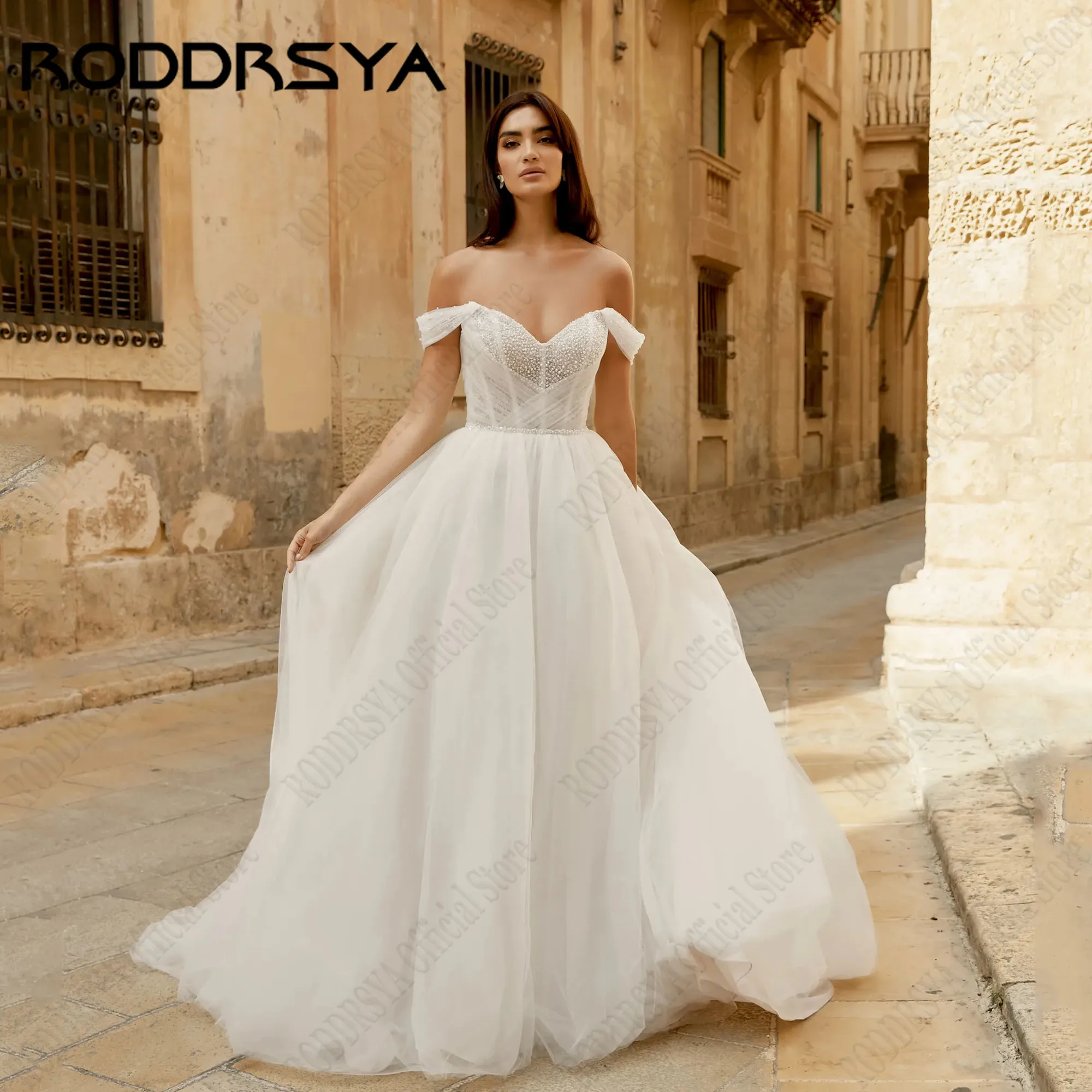 RODDRSYA Off Shoulder Pearls Wedding Dress Tulle A-Line Backless Gown For Bride 2025 Elegant V-Neck vestidos de novia Customized
RODDRSYA Off Shoulder Pearls Wedding Dress Tulle A-Line Backless Gown For Bride 2025 Elegant V-Neck vestidos de novia Customized