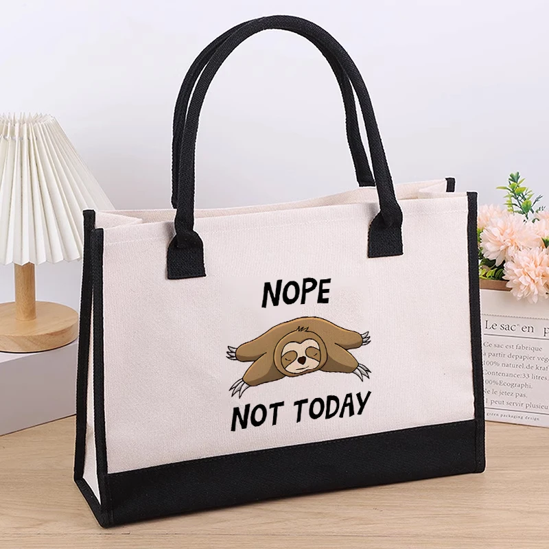 Sleeping sloth spot handbag canvas bag women's work commuting handheld large capacity black bottom canvas bag
Sleeping sloth spot handbag canvas bag women's work commuting handheld large capacity black bottom canvas bag