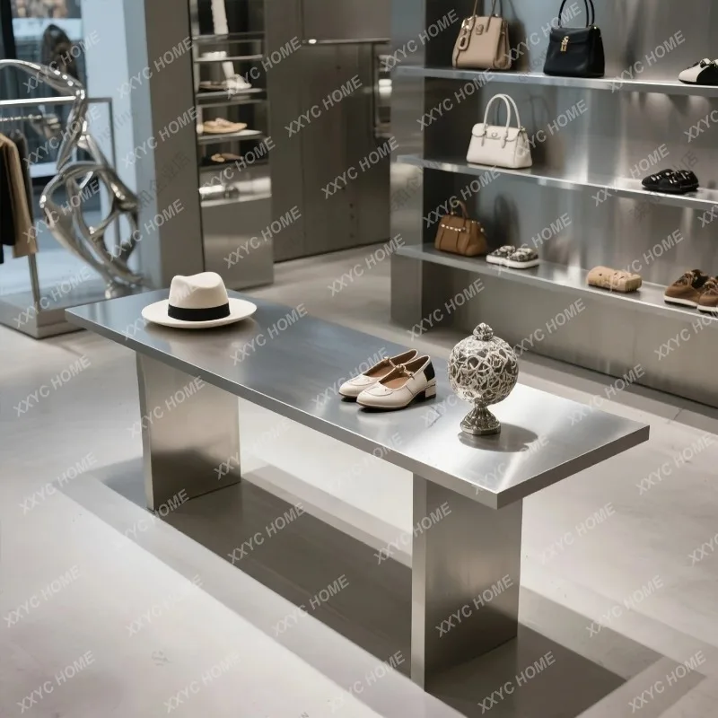 XX Clothing store Nakajima table, flowing water table, stainless steel display table, shoe bag shoe store display table
XX Clothing store Nakajima table, flowing water table, stainless steel display table, shoe bag shoe store display table
