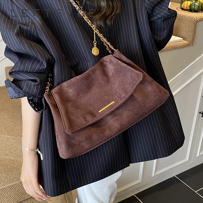 Левая сторона, маленькие замшевые сумки на плечо в стиле ретро для женщин, сумка через плечо с цепочкой, зима 2024, роскошные дизайнерские трендовые кошельки и сумки 
Левая сторона, маленькие замшевые сумки на плечо в стиле ретро для женщин, сумка через плечо с цепочкой, зима 2024, роскошные дизайнерские трендовые кошельки и сумки