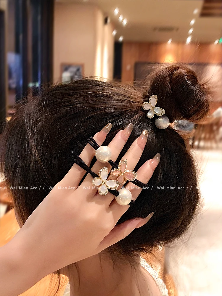 Rhinestone butterfly pearl hair tie women's fashion Korean ponytail hair band new hair accessories for girls
Rhinestone butterfly pearl hair tie women's fashion Korean ponytail hair band new hair accessories for girls
