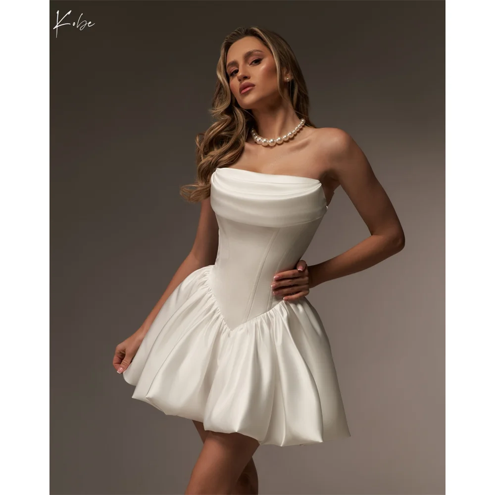 Kobe White Strapless Mini Party Dresses Lace-Up Satin Evening Dresses Sexy Pleated Customized Prom Dresses 2025
Kobe White Strapless Mini Party Dresses Lace-Up Satin Evening Dresses Sexy Pleated Customized Prom Dresses 2025