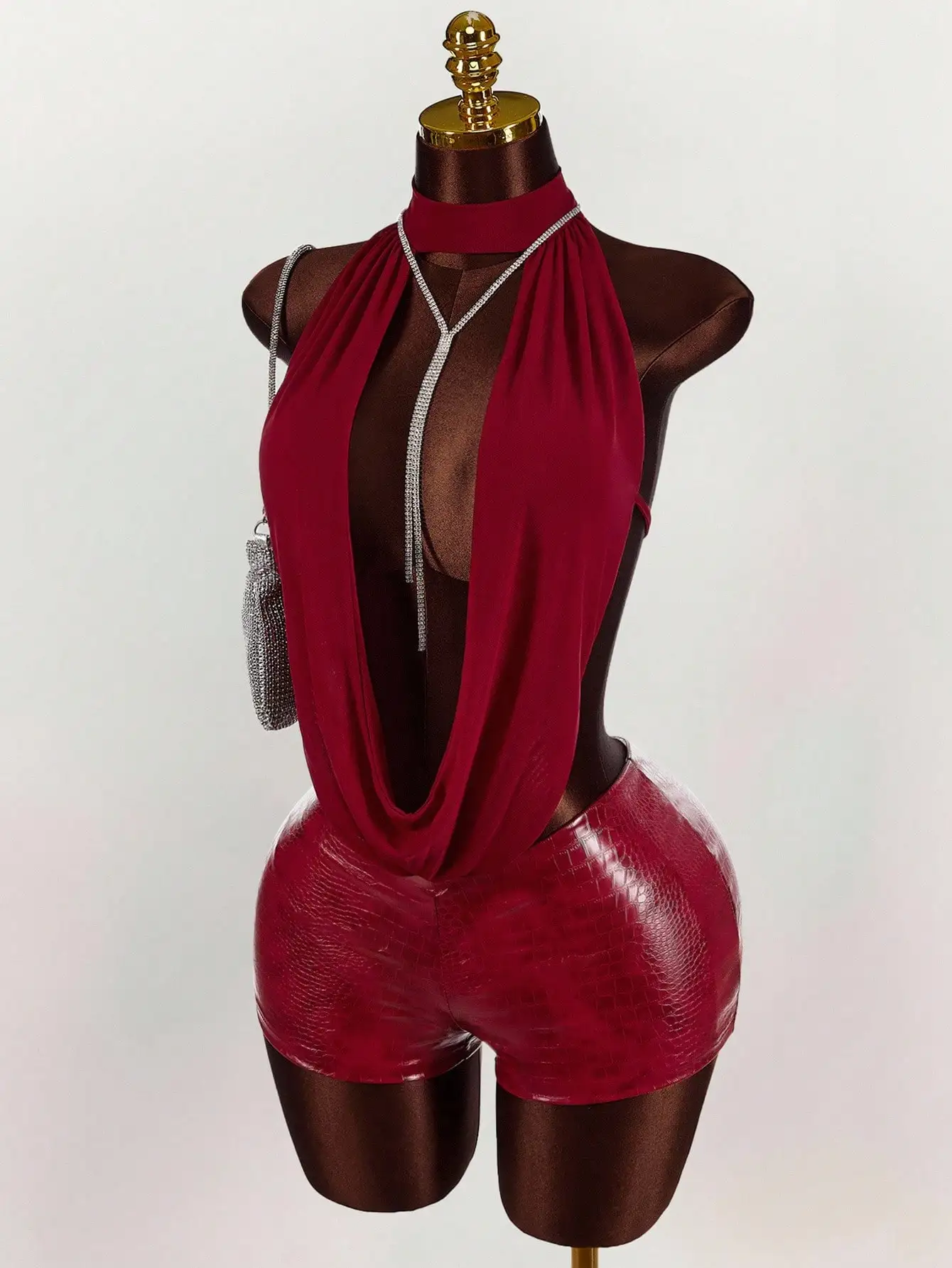 Women's Solid-Color Mesh Halter Top and Leather Jumpsuit
Women's Solid-Color Mesh Halter Top and Leather Jumpsuit