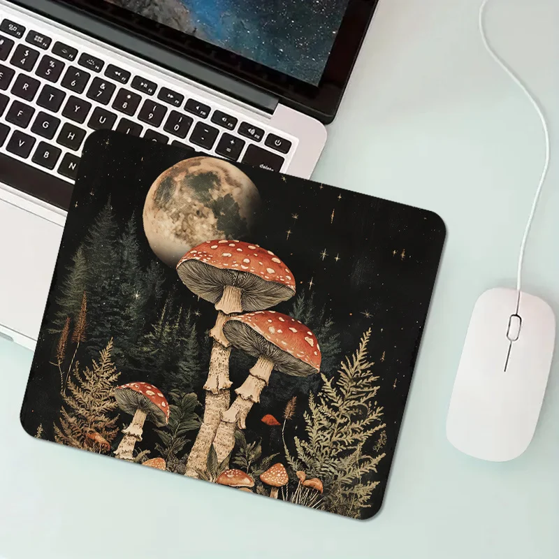 A mouse pad printed with moonlight mushrooms, with a non-slip rubber base, a portable mouse pad for household use
A mouse pad printed with moonlight mushrooms, with a non-slip rubber base, a portable mouse pad for household use