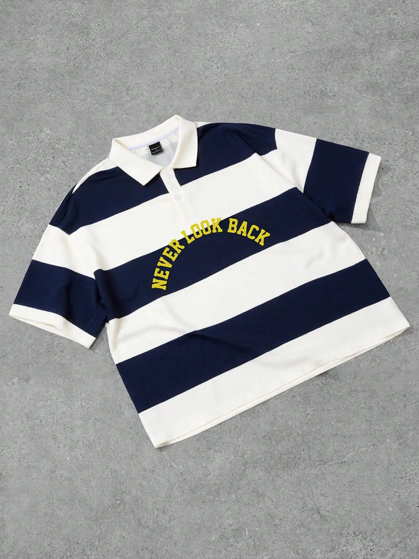 Men's Navy and Cream Striped Polo Shirt with Arch Graphic Print
Men's Navy and Cream Striped Polo Shirt with Arch Graphic Print