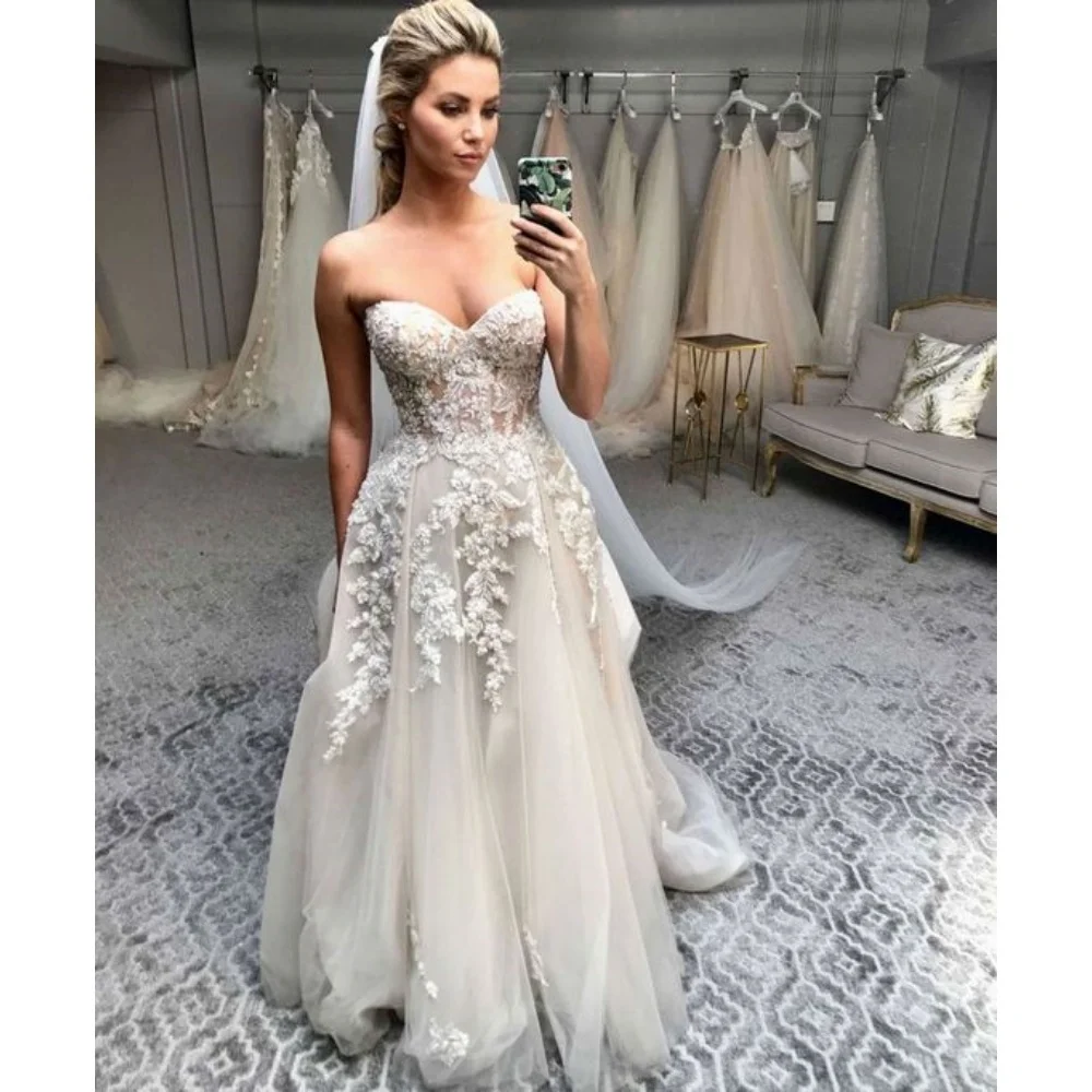 2025 Sweetheart A-Line Boho Wedding Dresses Lace Appliques Ivory Tulle Long Beach Bridal Gown Backless Lace-Up
2025 Sweetheart A-Line Boho Wedding Dresses Lace Appliques Ivory Tulle Long Beach Bridal Gown Backless Lace-Up