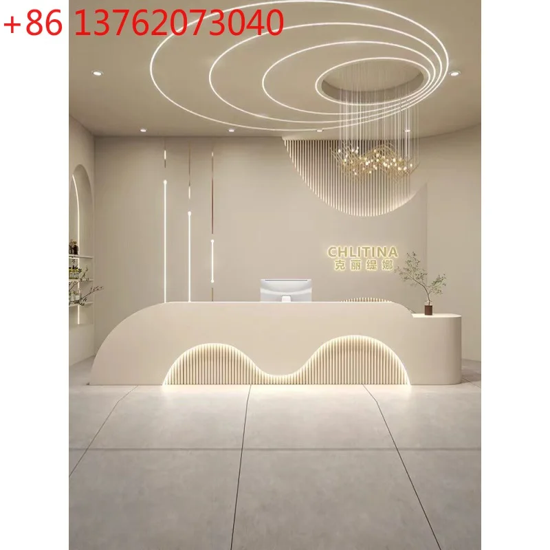 Легкая роскошная касса для салона красоты, женская одежда, изогнутый магазин, современная простая стойка регистрации, краска для выпечки
Легкая роскошная касса для салона красоты, женская одежда, изогнутый магазин, современная простая стойка регистрации, краска для выпечки