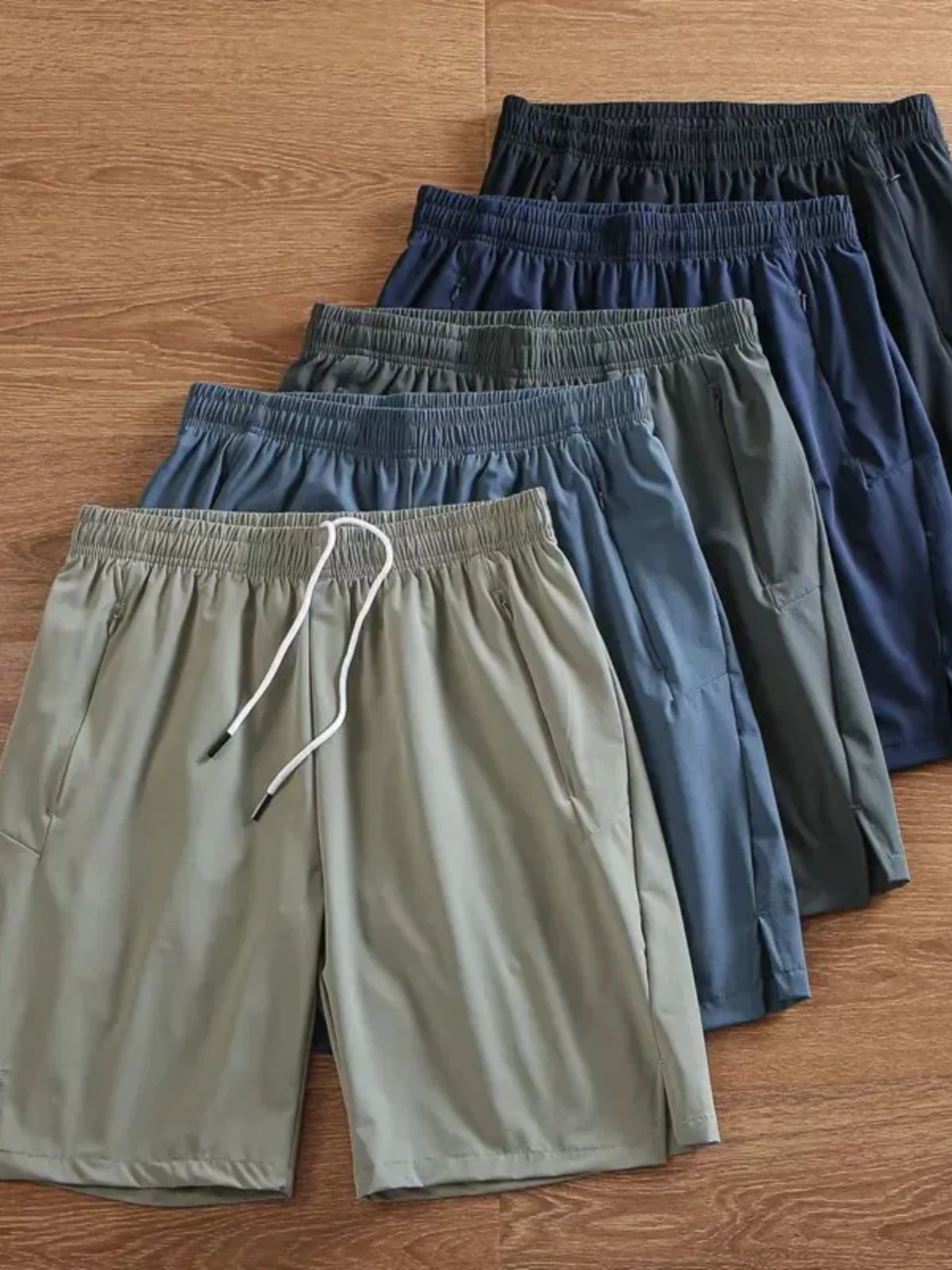 Outdoor Men's Lightweight Qui-Drng Breathable Reflective Print Five-Quarter Casual Pants Summer Sports orts
Outdoor Men's Lightweight Qui-Drng Breathable Reflective Print Five-Quarter Casual Pants Summer Sports orts