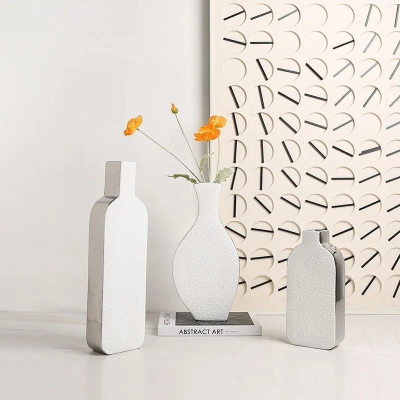 Modern minimalist silver border texture ceramic vase ornaments,home decoration art vase,Nordic vase,Nordic style home decoration
Modern minimalist silver border texture ceramic vase ornaments,home decoration art vase,Nordic vase,Nordic style home decoration