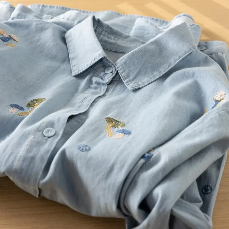 2024 Autumn New Korean Version of Loose School Style Mushroom Embroidery Lapel Long Sleeve Denim Shirt Blouse
2024 Autumn New Korean Version of Loose School Style Mushroom Embroidery Lapel Long Sleeve Denim Shirt Blouse