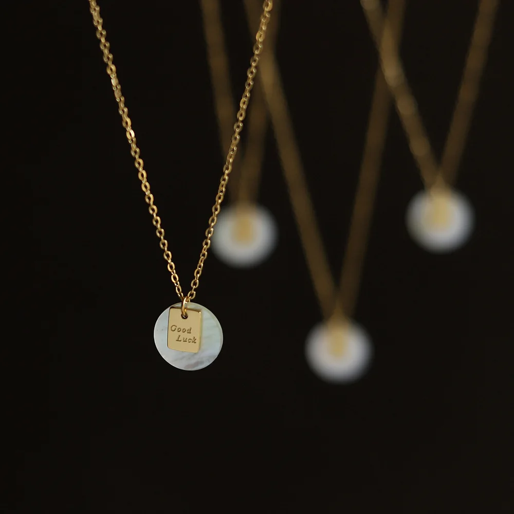 RHYSONG Natural White Shell Round Pendant With Square Letter Charm 316L Stainless Steel Plated 18K Jewelry Women Trendy Necklace
RHYSONG Natural White Shell Round Pendant With Square Letter Charm 316L Stainless Steel Plated 18K Jewelry Women Trendy Necklace