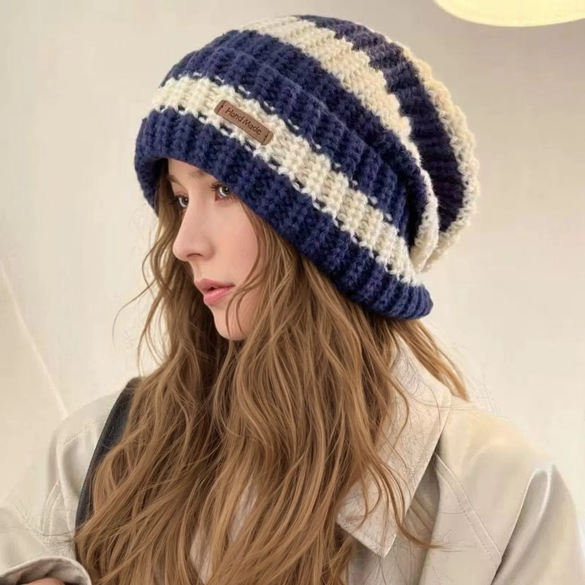 Hot-selling women's loose winter hat, fashionable striped stitched knit hat, soft wool hat, women's street-style hat
Hot-selling women's loose winter hat, fashionable striped stitched knit hat, soft wool hat, women's street-style hat