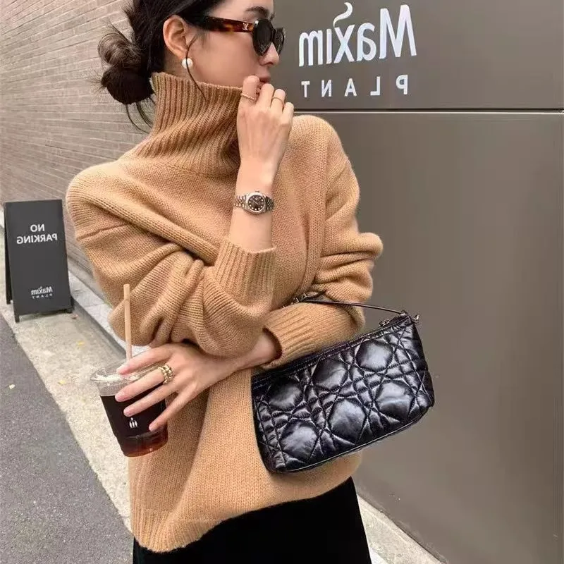 2025 New high-neck thickened cashmere sweater for women's autumn and winter loose knitted wool base sweater
2025 New high-neck thickened cashmere sweater for women's autumn and winter loose knitted wool base sweater