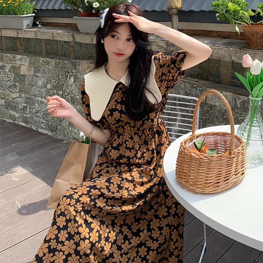 【New style】Doll collar floral French dress summer Korean loose medium and long splicing first love dress for women
【New style】Doll collar floral French dress summer Korean loose medium and long splicing first love dress for women