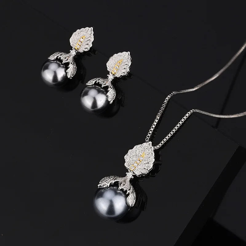 Micro Pave Clear Cubic Zircon Leaf Design Round Yellow Gray Shell Pearl Pendant Necklace Stud Earrings Jewelry Set
Micro Pave Clear Cubic Zircon Leaf Design Round Yellow Gray Shell Pearl Pendant Necklace Stud Earrings Jewelry Set