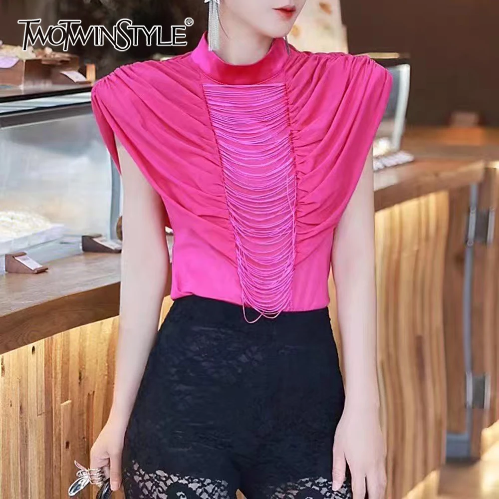 TWOTWINSTYLE White Spliced Tassel Shirt Female Turtleneck Sleeveless Shoulder Pads Loose Casual Women's Shirts Summer Style New
TWOTWINSTYLE White Spliced Tassel Shirt Female Turtleneck Sleeveless Shoulder Pads Loose Casual Women's Shirts Summer Style New