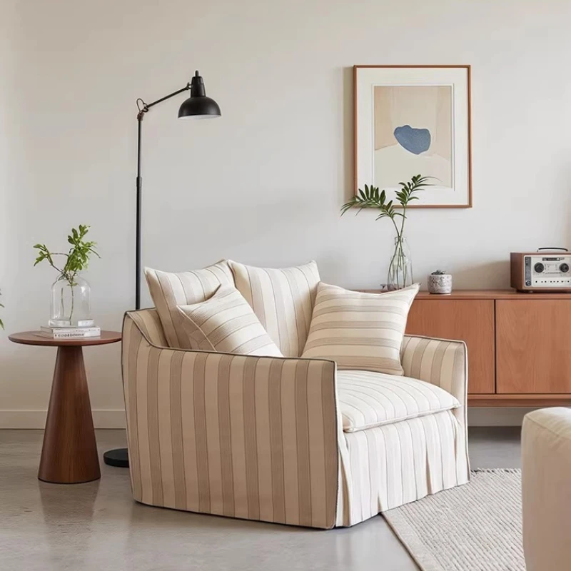 Leisure sofa chair wabi wind B & B living room small apartment fabric single sofa designer lazy sofa
Leisure sofa chair wabi wind B & B living room small apartment fabric single sofa designer lazy sofa