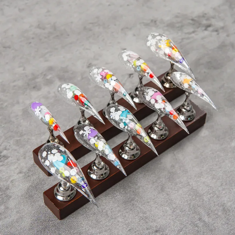 European and American style dragon claw transparent glitter fake nails Pointed nail color chip style Clear and breathable
European and American style dragon claw transparent glitter fake nails Pointed nail color chip style Clear and breathable