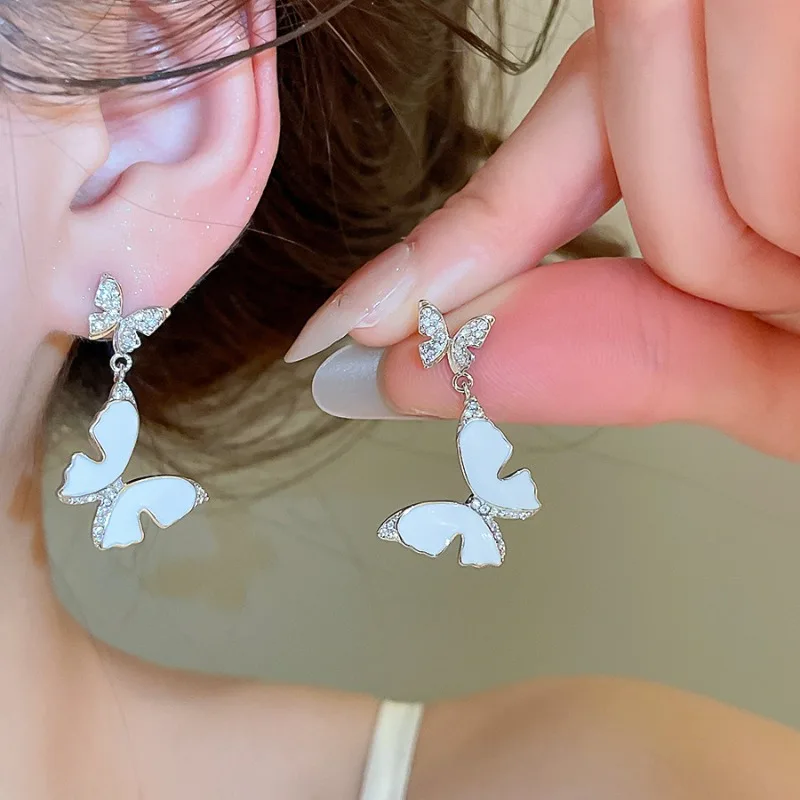 Minar Fairy White Enamel CZ Zircon Double Butterfly Wings Hanging Dangle Earrings for Women Silver Plated Copper Party Jewelry
Minar Fairy White Enamel CZ Zircon Double Butterfly Wings Hanging Dangle Earrings for Women Silver Plated Copper Party Jewelry