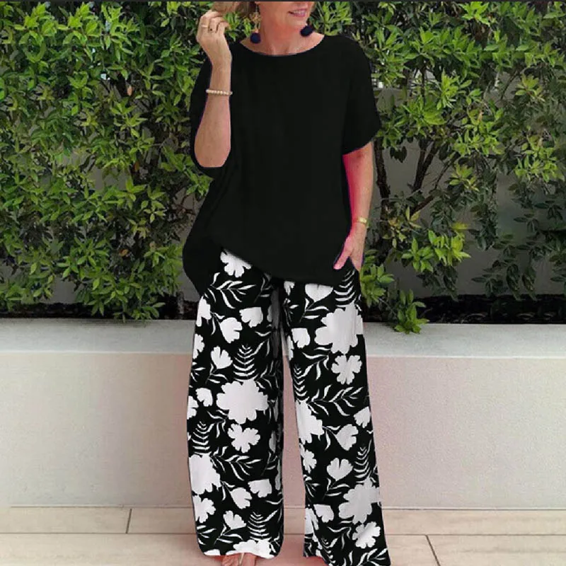 Retro Loose Two Piece Set Women Summer Solid Blouse Pullover Floral Print Pants Suit Elegant casual O Neck Short Sleeve Outfits
Retro Loose Two Piece Set Women Summer Solid Blouse Pullover Floral Print Pants Suit Elegant casual O Neck Short Sleeve Outfits