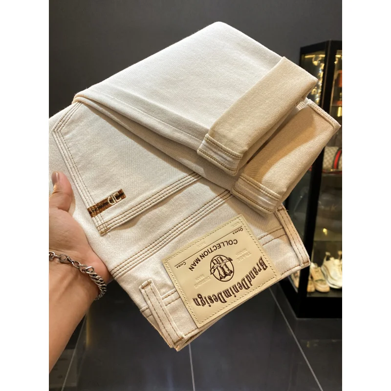 2025 autumn new beige straight leg jeans men's fashionable high-end embroidery printed elastic casual long pants
2025 autumn new beige straight leg jeans men's fashionable high-end embroidery printed elastic casual long pants