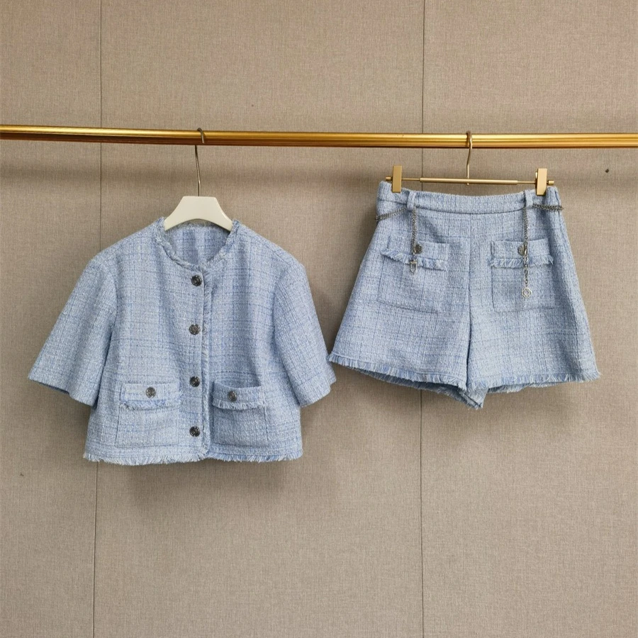 Women's blue two-piece suit with short sleeves, round neck, cropped top or slim-fitting pocket skirt
Women's blue two-piece suit with short sleeves, round neck, cropped top or slim-fitting pocket skirt