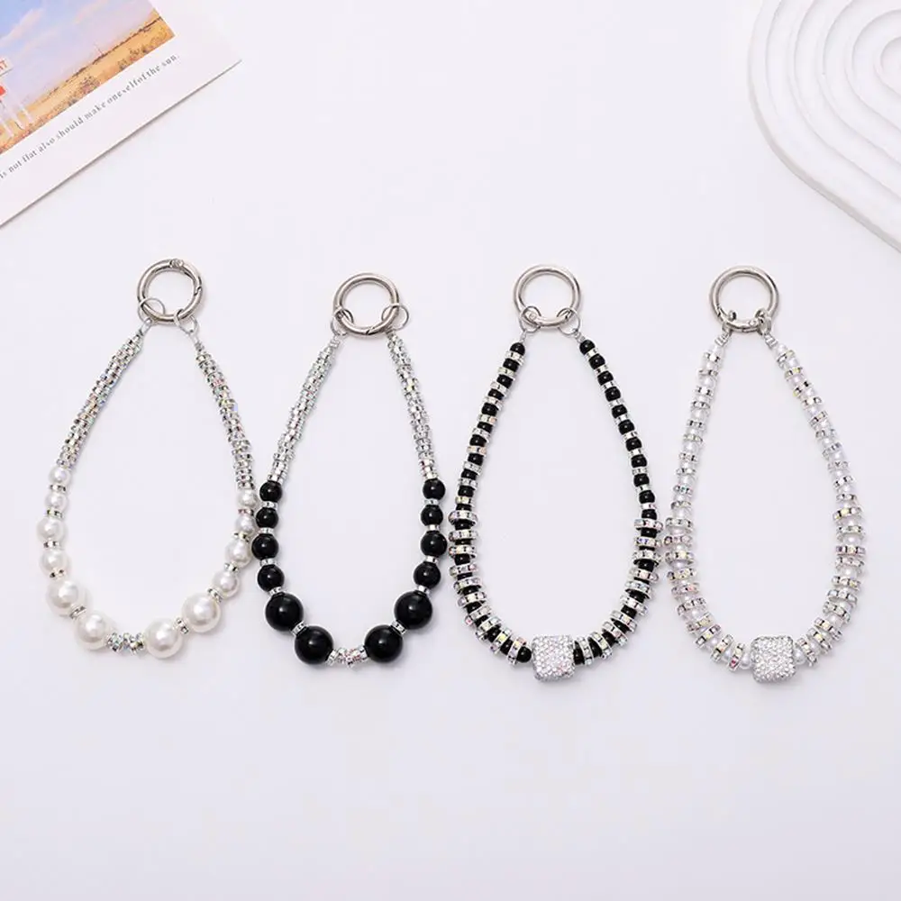 Luxury Rhinestone Mobile Phone Chain Bag Charms Phone Case Pendant Keychain Doll Anti Loss Rope Bracelet Chain Key Chains
Luxury Rhinestone Mobile Phone Chain Bag Charms Phone Case Pendant Keychain Doll Anti Loss Rope Bracelet Chain Key Chains