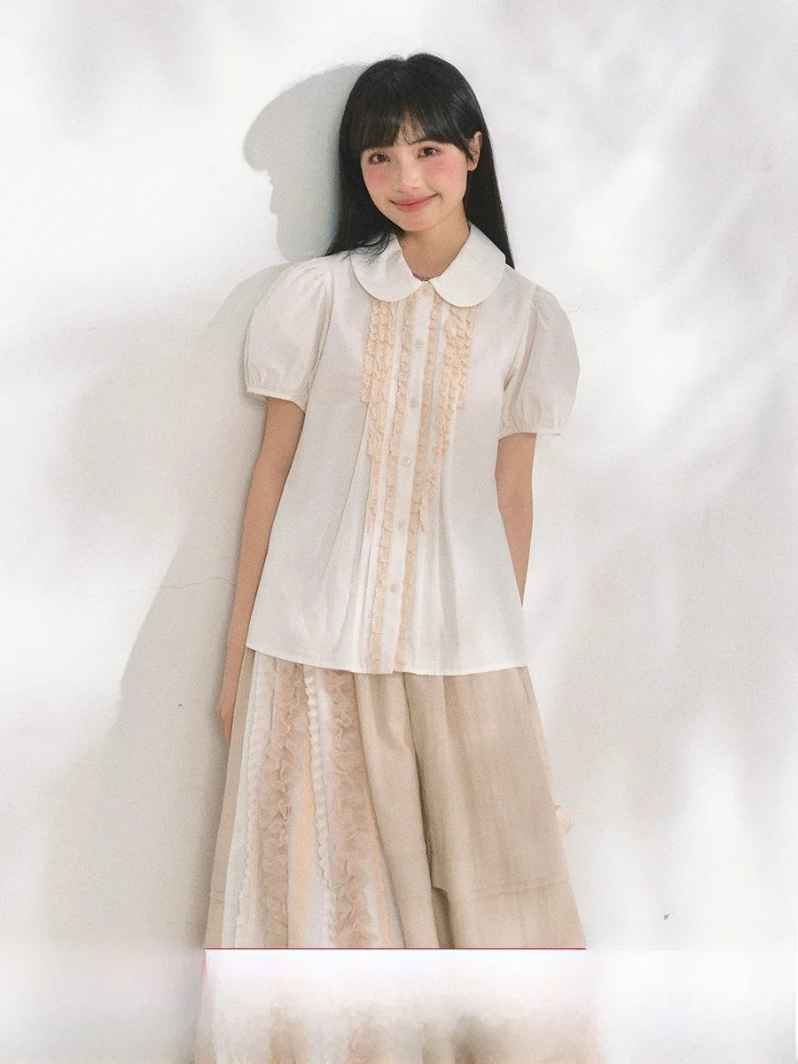 Летний женский комплект из хлопка: топ с коротким рукавом и юбка с кружевными вставками и цветными блоками, в стиле Holid Map Doll Collar
Летний женский комплект из хлопка: топ с коротким рукавом и юбка с кружевными вставками и цветными блоками, в стиле Holid Map Doll Collar