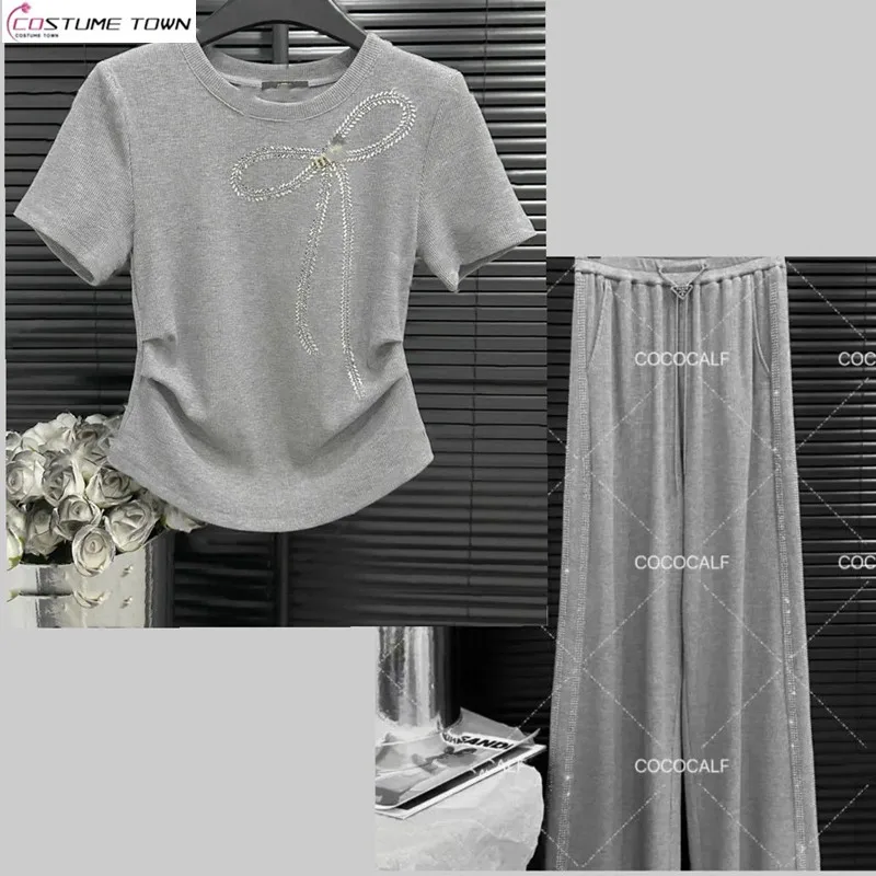Spring and summer new pearl hot stamping butterfly bow short sleeved top+slim fit wide leg pants two-piece set
Spring and summer new pearl hot stamping butterfly bow short sleeved top+slim fit wide leg pants two-piece set