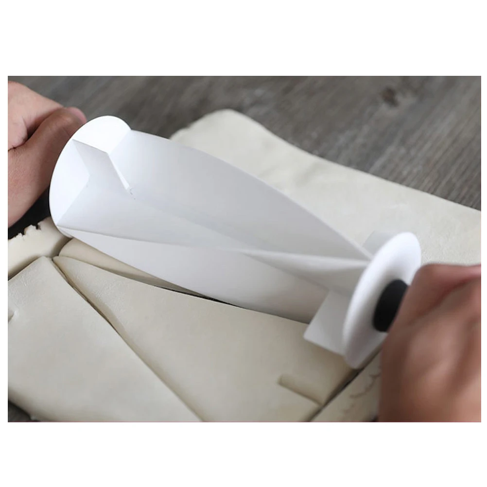 Plastic Croissant Cutter Roller Multi-Functional Dough Cutting Tool for Baking Pastry Cake Making Kitchen Gadgets Croissant
Plastic Croissant Cutter Roller Multi-Functional Dough Cutting Tool for Baking Pastry Cake Making Kitchen Gadgets Croissant