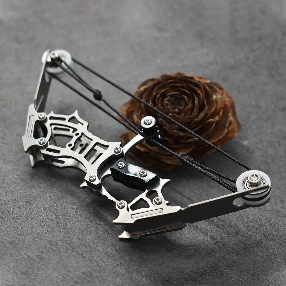 Metal Silver Mini Bow 15cm Bow Hunting Shooting Portable Equipment Small Palm Compound Bow Toy Outdoor Toy
Metal Silver Mini Bow 15cm Bow Hunting Shooting Portable Equipment Small Palm Compound Bow Toy Outdoor Toy