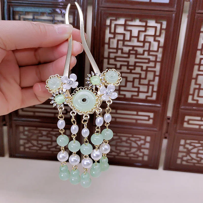 Новая U-образная заколка для волос в древнем стиле с имитацией нефрита, заколка с цветочной кисточкой, заколка для волос в китайском стиле
Новая U-образная заколка для волос в древнем стиле с имитацией нефрита, заколка с цветочной кисточкой, заколка для волос в китайском стиле