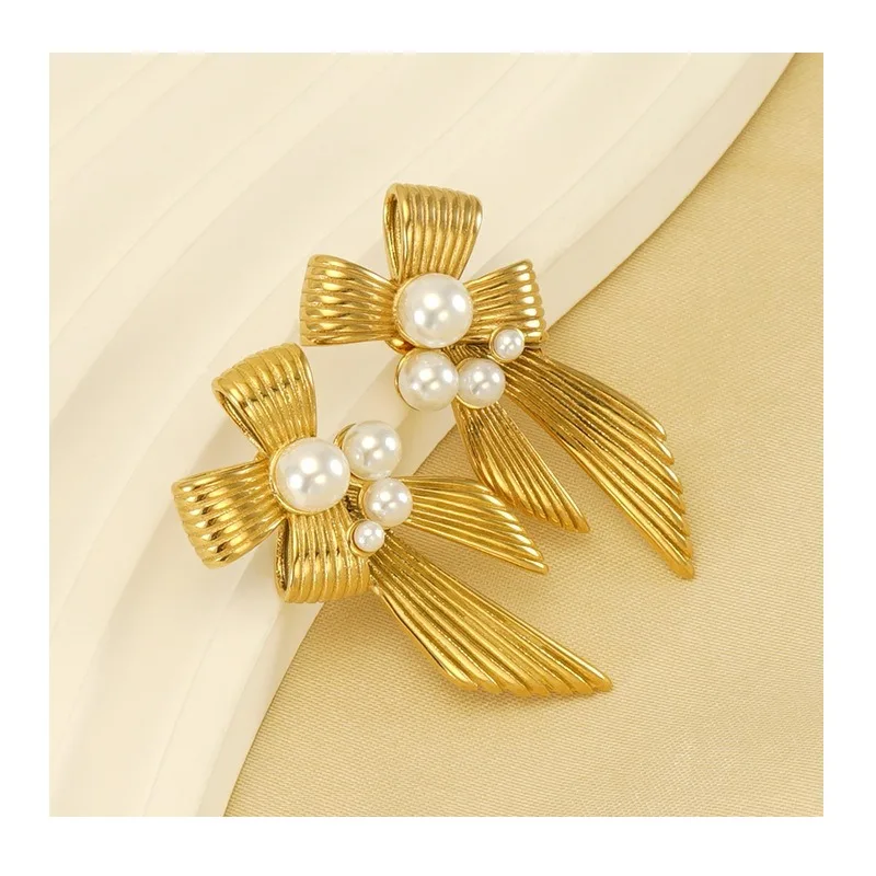 New Stainless Steel Temperament Pearl Bow Earrings Women's Niche Design Stud Earrings
New Stainless Steel Temperament Pearl Bow Earrings Women's Niche Design Stud Earrings
