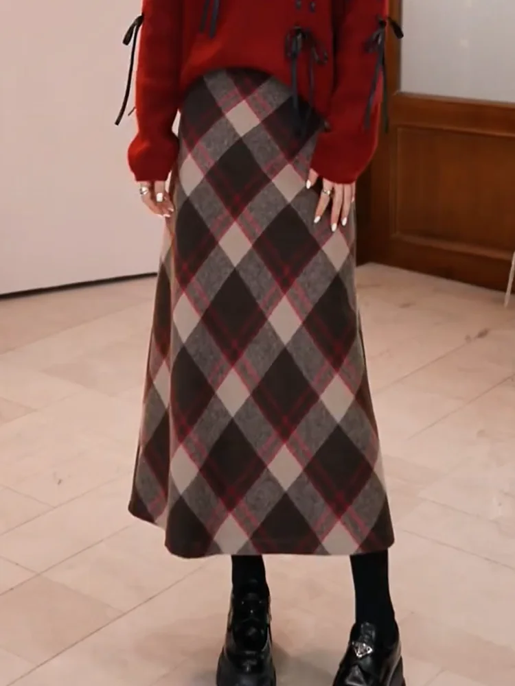 Ретро-юбка в клетку средней длины из утолщенной шерсти А-силуэта для женщин, новинка зимы, элегантная юбка с небольшим воротником-стойкой
Ретро-юбка в клетку средней длины из утолщенной шерсти А-силуэта для женщин, новинка зимы, элегантная юбка с небольшим воротником-стойкой