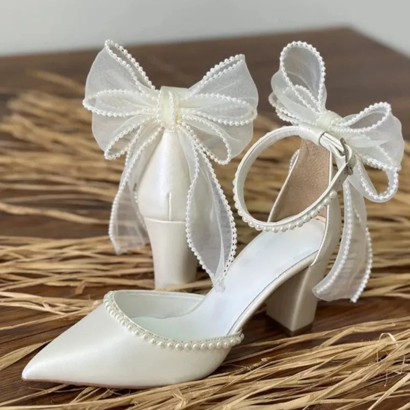 New Women Shoes Exquisite Imitation Pearl Bow High Heeled Sandals for Woman Elegant Wedding Shoes Designer Shoes Sandalias Mujer
New Women Shoes Exquisite Imitation Pearl Bow High Heeled Sandals for Woman Elegant Wedding Shoes Designer Shoes Sandalias Mujer