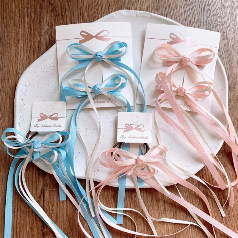 Заколки-бантики для волос с длинными лентами для милых девочек, эластичные резинки для двойных хвостиков, милые мягкие резинки для повседневного использования, детские аксессуары для волос
Заколки-бантики для волос с длинными лентами для милых девочек, эластичные резинки для двойных хвостиков, милые мягкие резинки для повседневного использования, детские аксессуары для волос