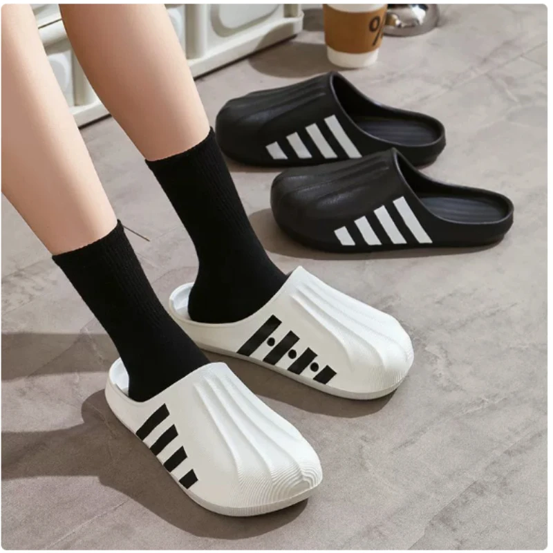 Shell Big Head Slippers for Men and Women 2026 Summer New Style EVA Comfortable Outerwear Thick Bottom Casual Hole Shoes
Shell Big Head Slippers for Men and Women 2026 Summer New Style EVA Comfortable Outerwear Thick Bottom Casual Hole Shoes