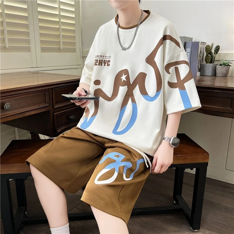 Summer Men Loose 2 Piece Set Short Sleeve T-Shirt Shorts Casual Oversize Teen Boys Fashion Streetwear Outfit
Summer Men Loose 2 Piece Set Short Sleeve T-Shirt Shorts Casual Oversize Teen Boys Fashion Streetwear Outfit