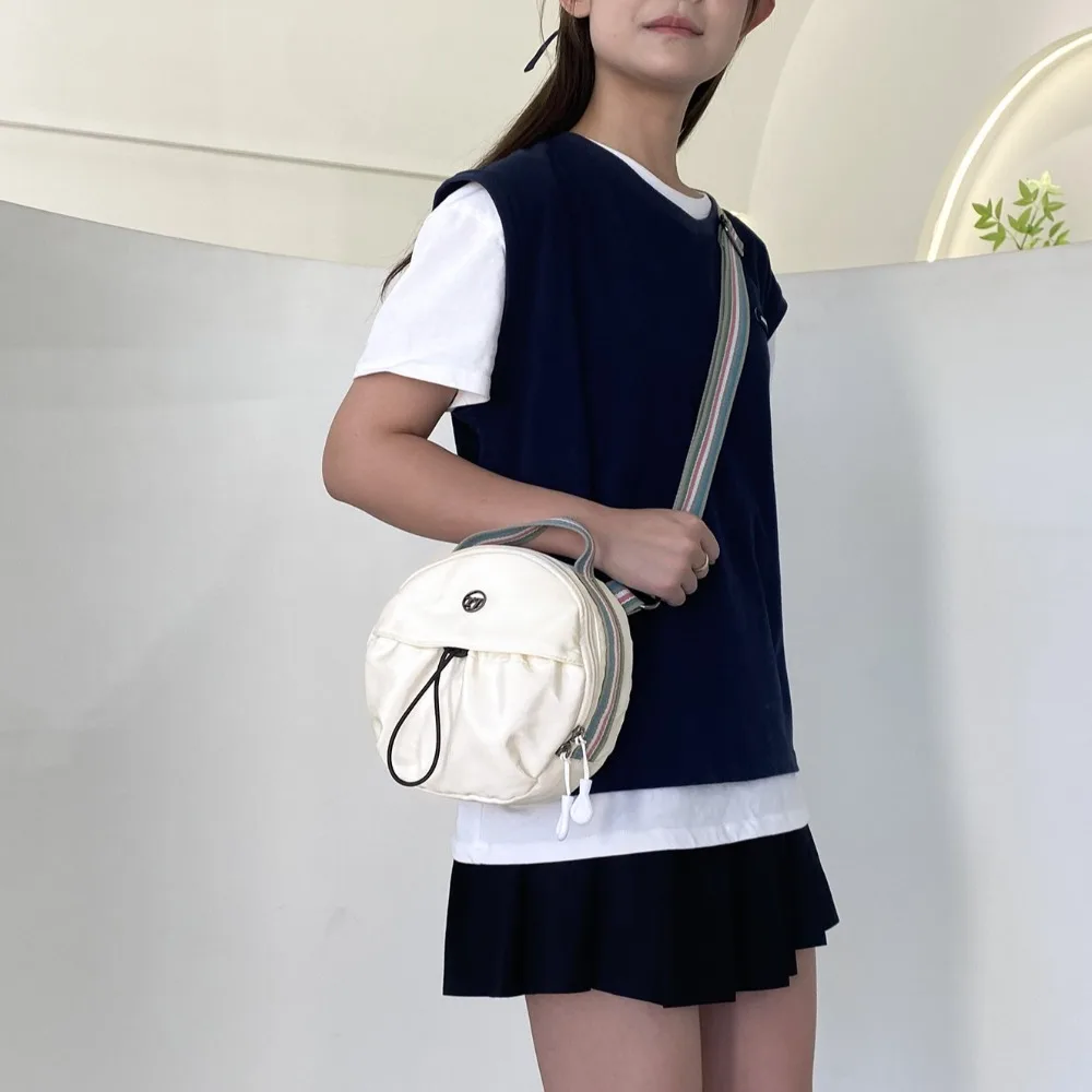 Nylon Mobile Phone Storage Bag Casual Large Capacity Small Round Backpack Solid Color Korean Style Single Shoulder Bag Students
Nylon Mobile Phone Storage Bag Casual Large Capacity Small Round Backpack Solid Color Korean Style Single Shoulder Bag Students