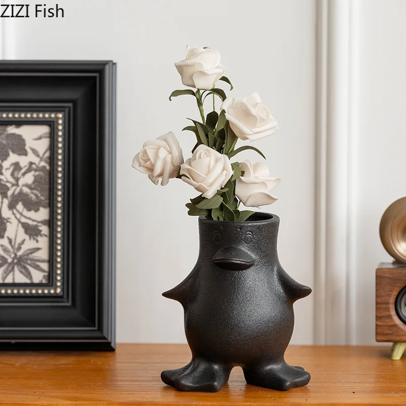 Minimalist Penguin Shape Ceramic Vase Table Decoration Creative Floral Vases Artificial Flowers Decorative Flower Arrangement
Minimalist Penguin Shape Ceramic Vase Table Decoration Creative Floral Vases Artificial Flowers Decorative Flower Arrangement