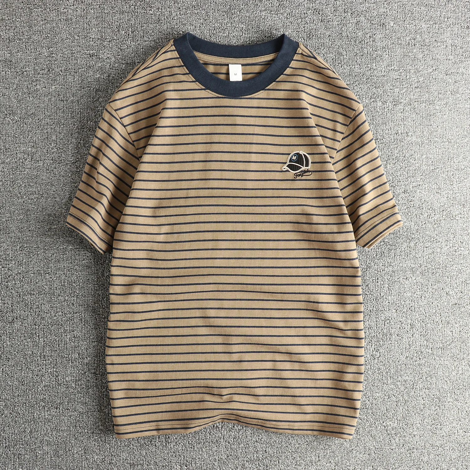 Washed Cotton Short Sleeve T-Shirt with Cap Embroidery Loose Fit Youthful Striped Print Casual Wear for Men Summer Fashion
Washed Cotton Short Sleeve T-Shirt with Cap Embroidery Loose Fit Youthful Striped Print Casual Wear for Men Summer Fashion